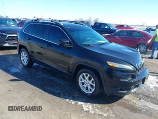 2014 Jeep Cherokee Latitude with VIN 1C4PJLCS3EW287378, listed as a IAAI auction lot 41655723 with 100,927 mi miles. Bid and sale history available at carsss.com. Image 1.