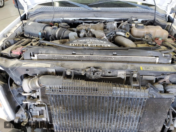 2008 Ford F-250 XL z VIN 1FTSX21R78EB83683, wystawiony jako Copart lot #59397325 z przebiegiem 230 601 mil mil oraz Szkoda całkowita • Salvage title. Historia ofert i sprzedaży dostępna na DreamBid. Obrazek 11.