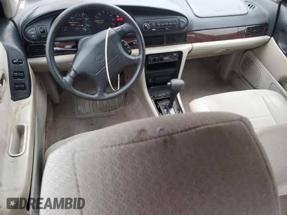1996 Nissan Altima XE z VIN 1N4BU31D1TC118891, wystawiony jako Copart lot #73860614 z przebiegiem 158 039 mil mil oraz Szkoda całkowita • Salvage title. Historia ofert i sprzedaży dostępna na DreamBid. Obrazek 8.