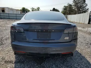 2023 Tesla Model S Plaid z VIN 5YJSA1E61PF518977, wystawiony jako Copart lot #60391625 z przebiegiem Nie podano mil oraz Szkoda całkowita • Salvage title. Historia ofert i sprzedaży dostępna na DreamBid. Obrazek 6.