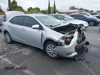2019 Toyota Corolla L with VIN 5YFBURHE4KP929909, listed as a IAAI auction lot 42078797 with 131,741 mi miles. Bid and sale history available at carsss.com. Image 1.