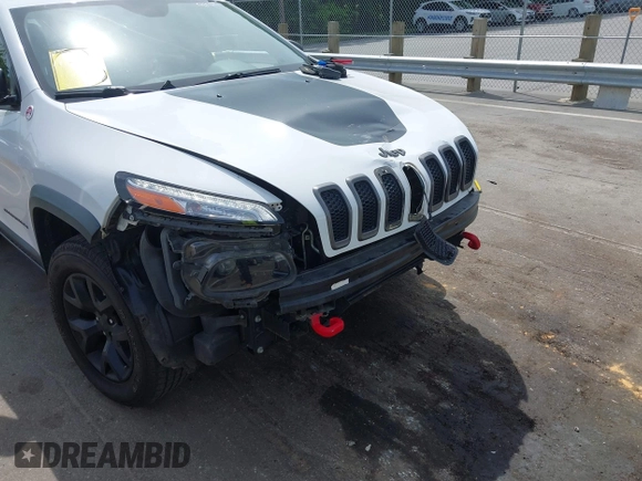 2016 Jeep Cherokee Trailhawk z VIN 1C4PJMBS7GW109189, wystawiony jako IAAI lot #42219470 z przebiegiem 115 197 mil mil oraz . Historia ofert i sprzedaży dostępna na DreamBid. Obrazek 6.