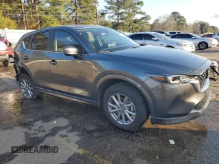2024 Mazda CX-5 S Preferred with VIN JM3KFBCL3R0428755, listed as a Copart auction lot 44017565 with 8,562 mi miles and Salvage Title. Bid and sale history available at carsss.com. Image 4.