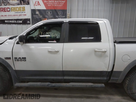 2016 Ram 1500 Rebel z VIN 1C6RR7YT6GS108472, wystawiony jako IAAI lot #41761560 z przebiegiem 101 132 mil mil oraz . Historia ofert i sprzedaży dostępna na DreamBid. Obrazek 15.