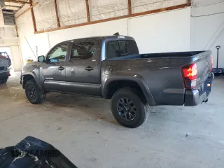 2023 Toyota Tacoma SR z VIN 3TMCZ5AN4PM599664, wystawiony jako Copart lot #57462455 z przebiegiem 65 736 mil mil oraz Szkoda całkowita • Salvage title. Historia ofert i sprzedaży dostępna na DreamBid. Obrazek 2.