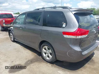 2014 Toyota Sienna LE AAS with VIN 5TDKK3DC3ES435091, listed as a IAAI auction lot 42735534 with 150,132 mi miles and . Bid and sale history available at DreamBid. Image 3.