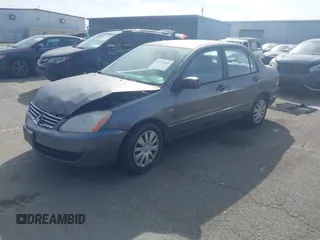 2006 Mitsubishi Lancer ES with VIN JA3AJ26E36U013907, listed as a IAAI auction lot 41722047 with 248,768 mi miles. Bid and sale history available at carsss.com. Image 2.