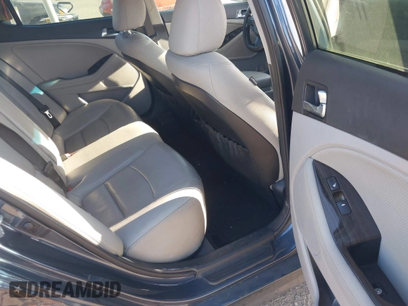 2015 Kia Optima EX with VIN 5XXGN4A77FG368704, listed as a IAAI auction lot 42174674 with 128,963 mi miles. Bid and sale history available at carsss.com. Image 8.