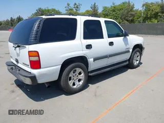 2003 Chevrolet Tahoe LS with VIN 1GNEC13V73R265144, listed as a IAAI auction lot 42464386 with 238,249 mi miles and . Bid and sale history available at DreamBid. Image 4.