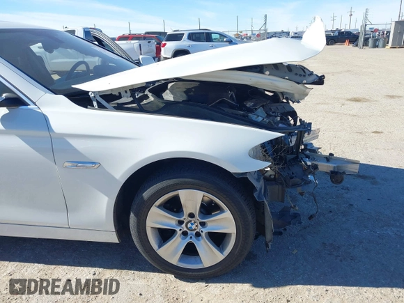 2013 BMW 5 Series 528i with VIN WBAXG5C59DDY32432, listed as a IAAI auction lot 41230673 with 103,069 mi miles and . Bid and sale history available at carsss.com. Image 6.