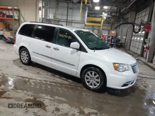 2015 Chrysler Town & Country Touring with VIN 2C4RC1BG0FR628721, listed as a IAAI auction lot 41101486 with 125,942 mi miles. Bid and sale history available at carsss.com. Image 1.