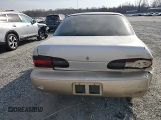 1996 Geo Prizm LSi z VIN 1Y1SK5265TZ029457, wystawiony jako Copart lot #54611415 z przebiegiem 174 816 mil mil oraz Szkoda całkowita • Salvage title. Historia ofert i sprzedaży dostępna na DreamBid. Obrazek 6.