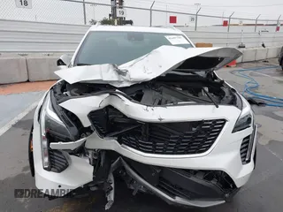 2022 Cadillac XT4 FWD Premium Luxury with VIN 1GYFZCR49NF100393, listed as a IAAI auction lot 42497187 with 23,672 mi miles and . Bid and sale history available at DreamBid. Image 6.