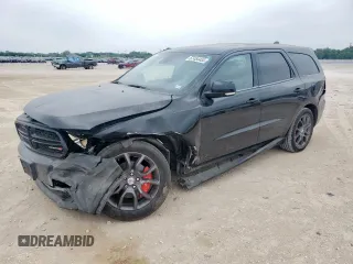 2016 Dodge Durango R/T with VIN 1C4SDHCT3GC483283, listed as a Copart auction lot 57454455 with 131,804 mi miles and Salvage title. Bid and sale history available at DreamBid. Image 1.