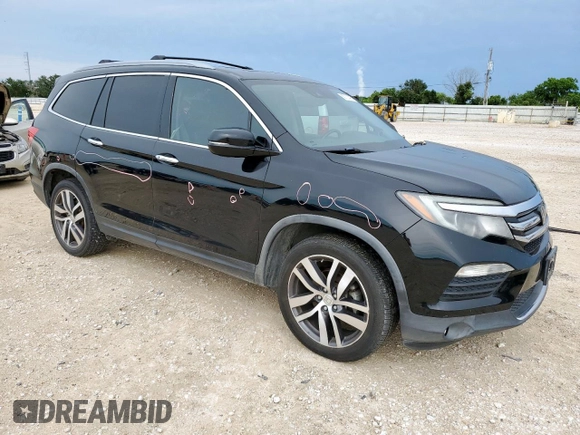 2017 Honda Pilot Elite with VIN 5FNYF6H0XHB047297, listed as a Copart auction lot 60731495 with 158,341 mi miles and Salvage title. Bid and sale history available at DreamBid. Image 4.