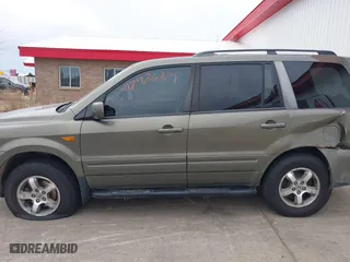 2007 Honda Pilot EX-L with VIN 2HKYF18767H538207, listed as a IAAI auction lot 41747624 with 214,026 mi miles. Bid and sale history available at carsss.com. Image 15.