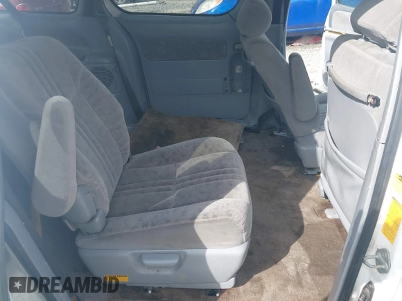 2003 Toyota Sienna LE with VIN 4T3ZF13CX3U525214, listed as a IAAI auction lot 41750644 with 286,454 mi miles. Bid and sale history available at carsss.com. Image 8.