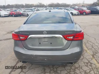 2017 Nissan Maxima S with VIN 1N4AA6AP1HC361740, listed as a IAAI auction lot 40868494 with 90,607 mi miles and . Bid and sale history available at DreamBid. Image 17.