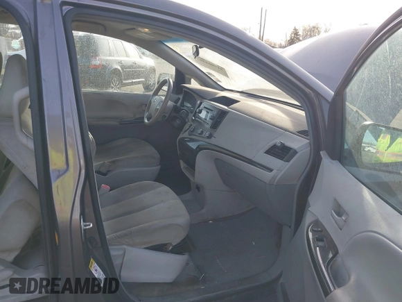 2012 Toyota Sienna with VIN 5TDZK3DCXCS258843, listed as a IAAI auction lot 41700446 with 207,384 mi miles. Bid and sale history available at carsss.com. Image 5.