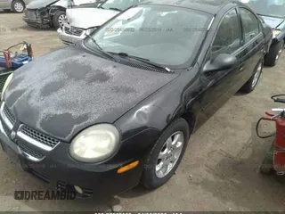 2003 Dodge Neon SXT with VIN 1B3ES56C63D251649, listed as a IAAI auction lot 27562059 with 222,302 mi miles. Bid and sale history available at carsss.com. Image 2.