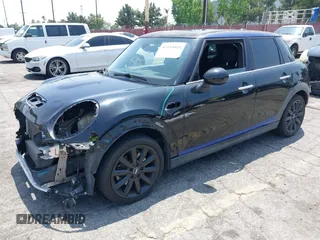 2015 MINI Hardtop 4 Door S z VIN WMWXU3C58F2B66601, wystawiony jako IAAI lot #42444404 z przebiegiem 76 174 mil mil oraz . Historia ofert i sprzedaży dostępna na DreamBid. Obrazek 2.