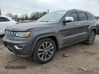 2017 Jeep Grand Cherokee Overland with VIN 1C4RJFCT5HC874593, listed as a Copart auction lot 46770205 with 72,744 mi miles and Salvage Title. Bid and sale history available at carsss.com. Image 1.