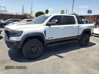 2022 Ram 1500 TRX with VIN 1C6SRFU9XNN215610, listed as a Copart auction lot 59362484 with 23,904 mi miles and Salvage title. Bid and sale history available at DreamBid. Image 1.