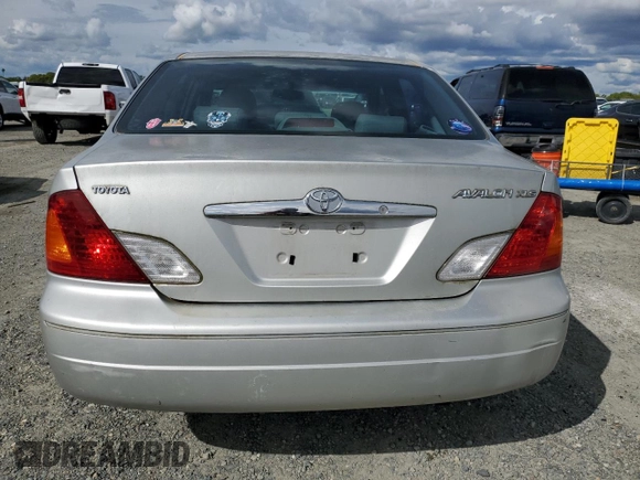 2000 Toyota Avalon XL with VIN 4T1BF28B3YU002835, listed as a Copart auction lot 50902115 with 128,699 mi miles and Salvage Title. Bid and sale history available at DreamBid. Image 6.