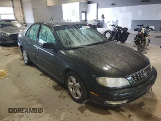 2000 Cadillac Catera z VIN W06VR54R7YR124650, wystawiony jako Copart lot #49602314 z przebiegiem 77 800 mil mil oraz Nie do naprawy. Historia ofert i sprzedaży dostępna na DreamBid. Obrazek 4.