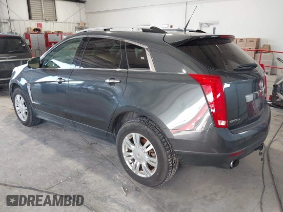 2012 Cadillac SRX Luxury Collection with VIN 3GYFNDE38CS654886, listed as a IAAI auction lot 41758399 with 210,680 mi miles. Bid and sale history available at carsss.com. Image 3.