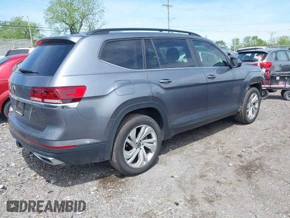 2022 Volkswagen Atlas SE z VIN 1V2JR2CA7NC523045, wystawiony jako IAAI lot #42072173 z przebiegiem 49 943 mil mil oraz . Historia ofert i sprzedaży dostępna na DreamBid. Obrazek 4.