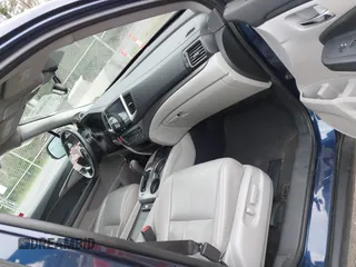 2016 Honda Pilot EX-L with VIN 5FNYF6H55GB050991, listed as a IAAI auction lot 41943049 with 158,255 mi miles. Bid and sale history available at carsss.com. Image 5.