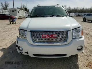 2006 GMC Envoy XL Denali with VIN 1GKES66MX66120332, listed as a Copart auction lot 49632955 with 100,580 mi miles and Salvage Title. Bid and sale history available at carsss.com. Image 12.