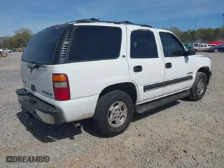2002 Chevrolet Tahoe LS with VIN 1GNEC13V52J284059, listed as a IAAI auction lot 41899231 with 390,173 mi miles. Bid and sale history available at carsss.com. Image 4.