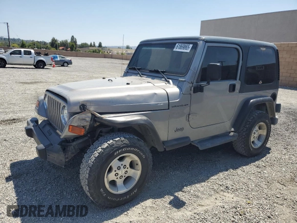 2000 Jeep Wrangler SE with VIN 1J4FA29P7YP737289, listed as a Copart auction lot 61869865 with 91,097 mi miles and Salvage title. Bid and sale history available at DreamBid. Image 1.