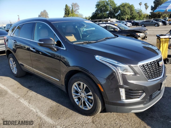2020 Cadillac XT5 Premium Luxury FWD with VIN 1GYKNCRS8LZ162923, listed as a Copart auction lot 52760275 with 82,549 mi miles and Clean Title. Bid and sale history available at carsss.com. Image 4.