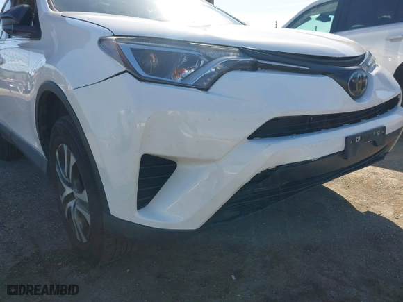 2018 Toyota RAV4 LE with VIN 2T3ZFREV8JW467744, listed as a IAAI auction lot 41818614 with 95,609 mi miles. Bid and sale history available at carsss.com. Image 18.