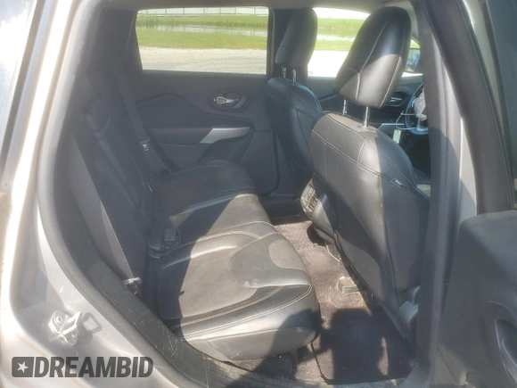 2018 Jeep Cherokee Latitude Plus z VIN 1C4PJMLX6JD500976, wystawiony jako Copart lot #64829185 z przebiegiem 62 491 mil mil oraz Szkoda całkowita • Salvage title. Historia ofert i sprzedaży dostępna na DreamBid. Obrazek 11.