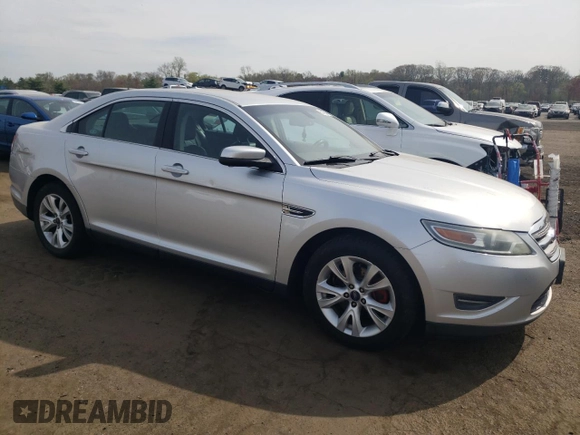 2012 Ford Taurus SEL z VIN 1FAHP2HW4CG129105, wystawiony jako Copart lot #54708445 z przebiegiem 201 450 mil mil oraz Szkoda całkowita • Salvage title. Historia ofert i sprzedaży dostępna na DreamBid. Obrazek 4.
