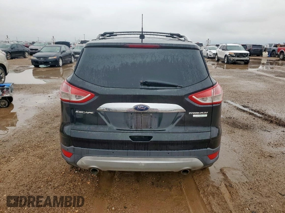 2014 Ford Escape Titanium с VIN 1FMCU0J90EUA04690, выставлен на аукционе Copart как лот 58421735 с пробегом 200 743 миль миль и Чистый • Clean title. История ставок и продаж доступна на DreamBid. Изображение 6.