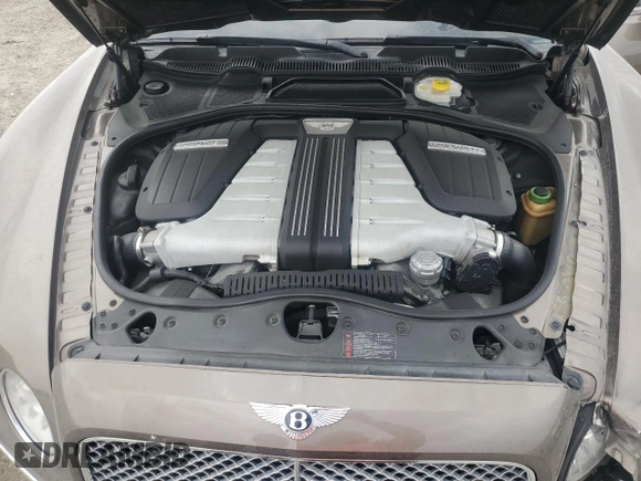 2014 Bentley Flying Spur с VIN SCBEC9ZA9EC091162, выставлен на аукционе Copart как лот 55941855 с пробегом 135 032 миль миль и Списание • Salvage title. История ставок и продаж доступна на DreamBid. Изображение 11.