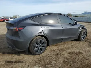 2024 Tesla Model Y with VIN 7SAYGDED5RF105278, listed as a Copart auction lot 44376125 with 12,693 mi miles and Salvage Title. Bid and sale history available at DreamBid. Image 3.