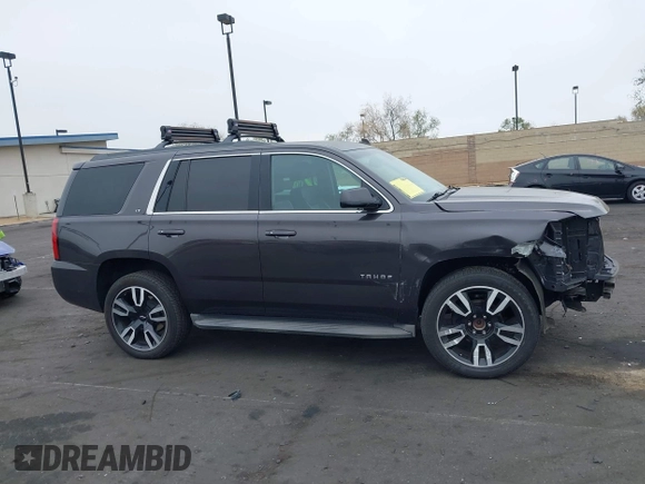 2015 Chevrolet Tahoe LT with VIN 1GNSCBKC1FR233898, listed as a IAAI auction lot 42004048 with 115,779 mi miles and . Bid and sale history available at DreamBid. Image 14.