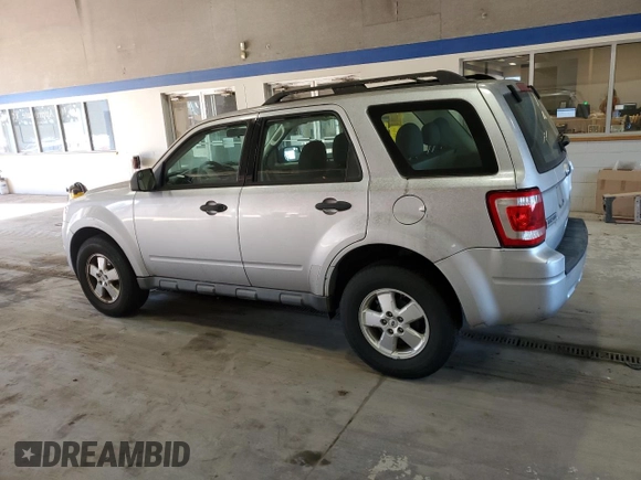 2010 Ford Escape XLS with VIN 1FMCU9C78AKA44179, listed as a Copart auction lot 80518154 with 175,149 mi miles and Salvage title. Bid and sale history available at DreamBid. Image 2.