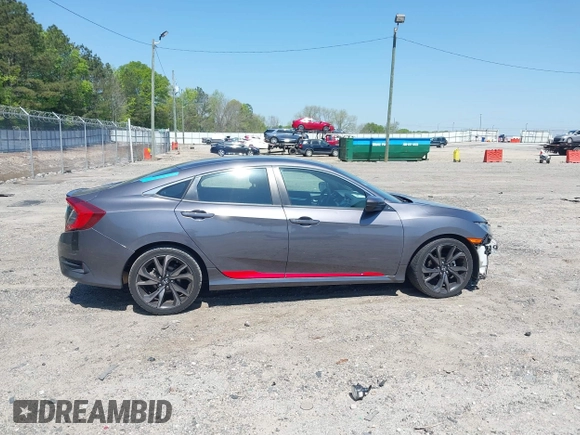 2019 Honda Civic Sport with VIN 2HGFC2F85KH576547, listed as a IAAI auction lot 42024497 with 86,468 mi miles and . Bid and sale history available at DreamBid. Image 13.