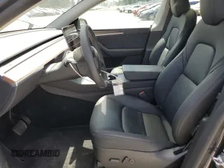 2024 Tesla Model Y с VIN 7SAYGDED1RF053003, выставлен на аукционе Copart как лот 63120195 с пробегом 8 679 миль миль и Списание • Salvage title. История ставок и продаж доступна на DreamBid. Изображение 7.