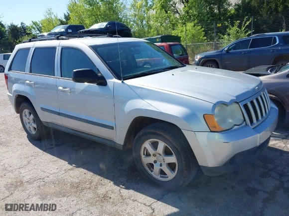2009 Jeep Grand Cherokee Laredo with VIN 1J8GS48K99C528145, listed as a IAAI auction lot 42077024 with 167,588 mi miles. Bid and sale history available at carsss.com. Image 1.