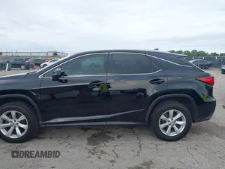2016 Lexus RX 350 z VIN 2T2BZMCA4GC017342, wystawiony jako IAAI lot #42357093 z przebiegiem 142 515 mil mil oraz . Historia ofert i sprzedaży dostępna na DreamBid. Obrazek 14.