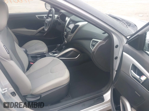 2012 Hyundai Veloster w/Black Int with VIN KMHTC6AD1CU034787, listed as a IAAI auction lot 42607847 with 126,912 mi miles and . Bid and sale history available at DreamBid. Image 5.