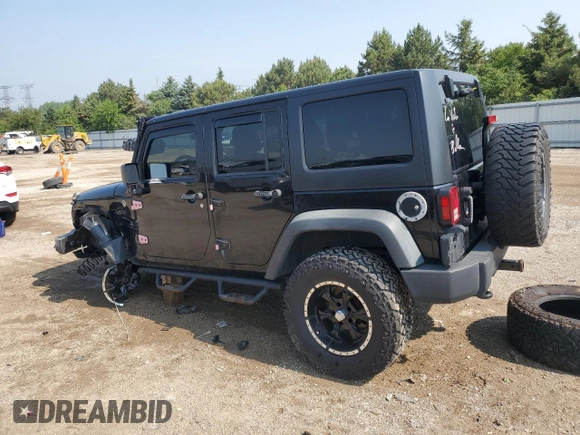 2012 Jeep Wrangler Unlimited Sport with VIN 1C4BJWDG8CL116811, listed as a Copart auction lot 59372085 with 95,498 mi miles and Salvage title. Bid and sale history available at DreamBid. Image 2.